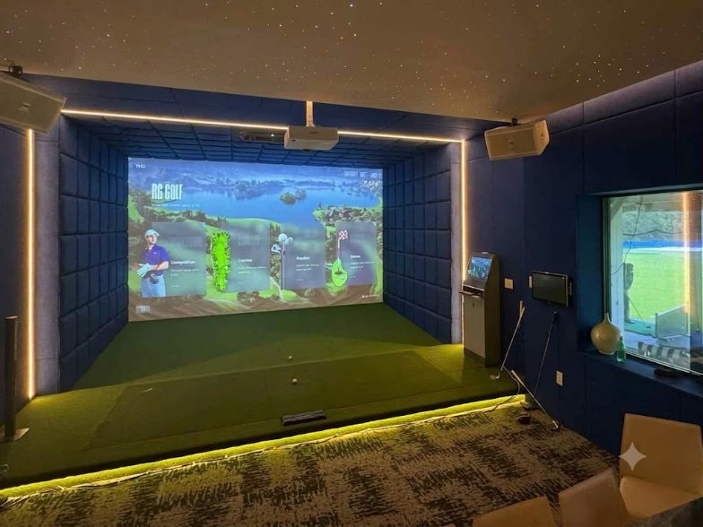 The same room finished with padded blue walls, star ceiling, LED trim and an RG Golf screen