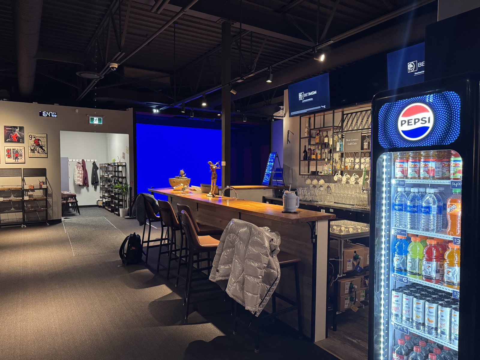 Golf O'Clock — bar area and simulator bay